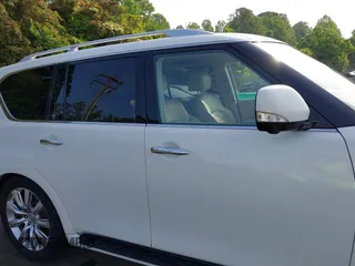 2012 Infiniti QX56 7-passenger z VIN JN8AZ2NE7C9023063, wystawiony jako IAAI lot #42145130 z przebiegiem 149 172 mil mil oraz . Historia ofert i sprzedaży dostępna na DreamBid. Obrazek 13.