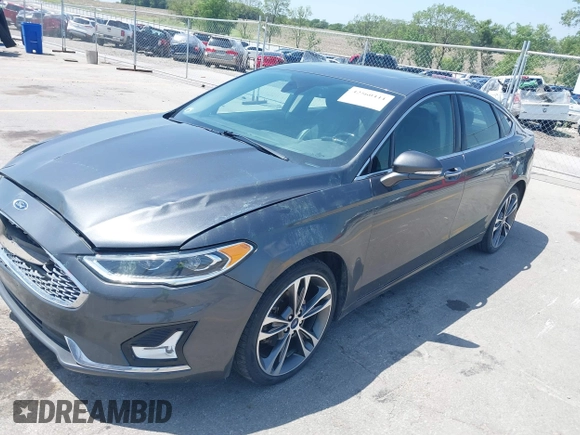 2020 Ford Fusion Titanium with VIN 3FA6P0D9XLR131042, listed as a IAAI auction lot 42560444 with 95,351 mi miles and . Bid and sale history available at DreamBid. Image 17.