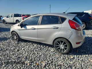 2015 Ford Fiesta S z VIN 3FADP4TJ4FM107573, wystawiony jako Copart lot #62332395 z przebiegiem Nie podano mil oraz Czysty tytuł • Clean title. Historia ofert i sprzedaży dostępna na DreamBid. Obrazek 2.