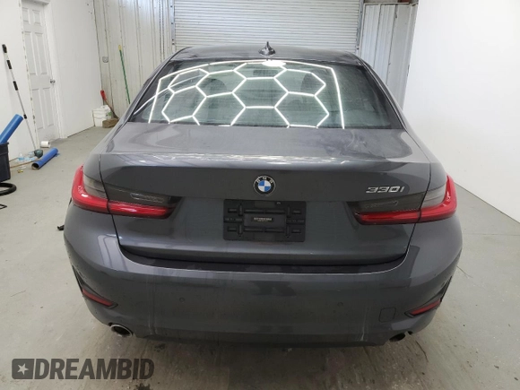2019 BMW 3 Series 330i with VIN WBA5R1C56KFH04731, listed as a Copart auction lot 56854405 with 99,999 mi miles and Clean title. Bid and sale history available at DreamBid. Image 6.