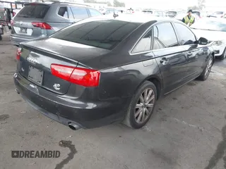 2014 Audi A6 Premium Plus z VIN WAUGFAFC7EN025053, wystawiony jako IAAI lot #42131033 z przebiegiem 154 552 mil mil oraz . Historia ofert i sprzedaży dostępna na DreamBid. Obrazek 4.