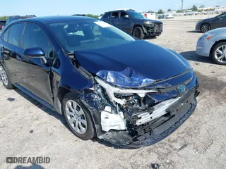 2024 Toyota Corolla Hybrid LE with VIN JTDBCMFE4RJ021466, listed as a IAAI auction lot 41976149 with 21,965 mi miles. Bid and sale history available at carsss.com. Image 6.