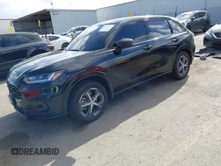 2024 Honda HR-V EX-L z VIN 3CZRZ1H7XRM736789, wystawiony jako IAAI lot #41934334 z przebiegiem 26 084 mil mil oraz . Historia ofert i sprzedaży dostępna na DreamBid. Obrazek 18.