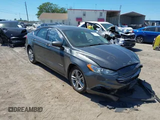 2018 Ford Fusion Hybrid S with VIN 3FA6P0UU3JR122443, listed as a IAAI auction lot 41898129 with 119,873 mi miles. Bid and sale history available at carsss.com. Image 1.