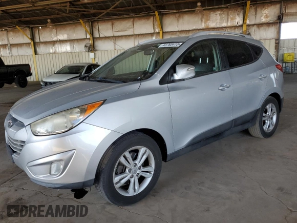 2013 Hyundai Tucson GLS with VIN KM8JU3AC9DU656873, listed as a Copart auction lot 43783415 with 143,513 mi miles and Salvage Title. Bid and sale history available at carsss.com. Image 1.
