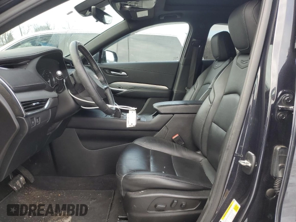 2022 Cadillac XT4 AWD Premium Luxury with VIN 1GYFZDR42NF140322, listed as a Copart auction lot 89084545 with 32,440 mi miles and Salvage Title. Bid and sale history available at carsss.com. Image 7.