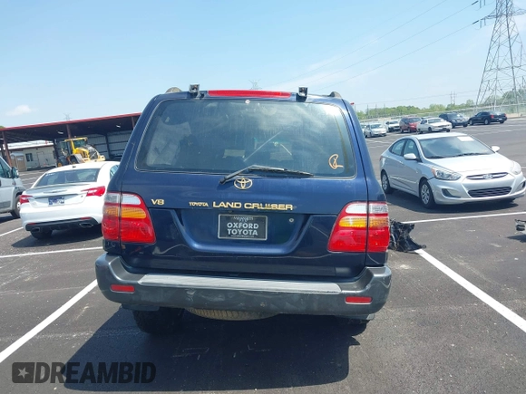 2000 Toyota Land Cruiser with VIN JT3HT05J8Y0123024, listed as a IAAI auction lot 42028792 with 360,074 mi miles. Bid and sale history available at carsss.com. Image 16.