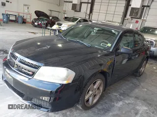 2014 Dodge Avenger SE with VIN 1C3CDZAB0EN202602, listed as a IAAI auction lot 42133657 with 130,741 mi miles. Bid and sale history available at carsss.com. Image 2.