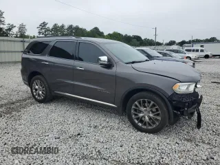 2014 Dodge Durango Citadel with VIN 1C4SDJET9EC435191, listed as a Copart auction lot 58572665 with 168,478 mi miles and Salvage title. Bid and sale history available at DreamBid. Image 4.