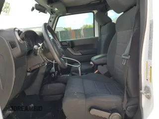 2016 Jeep Wrangler Unlimited Sport с VIN 1C4BJWDG9GL145305, выставлен на аукционе Copart как лот 59391845 с пробегом 101 425 миль миль и Списание • Salvage title. История ставок и продаж доступна на DreamBid. Изображение 7.