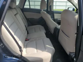 2016 Mazda CX-5 Touring с VIN JM3KE4CY8G0686101, выставлен на аукционе Copart как лот 60361215 с пробегом 126 804 миль миль и На запчасти • Non repairable. История ставок и продаж доступна на DreamBid. Изображение 10.