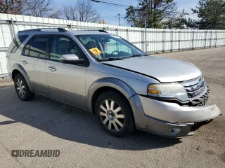 2008 Ford Taurus X SEL with VIN 1FMDK02W28GA05793, listed as a Copart auction lot 52317125 with 158,271 mi miles and Salvage title. Bid and sale history available at DreamBid. Image 4.