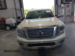 2016 Nissan Titan SL z VIN 1N6BA1F45GN517262, wystawiony jako IAAI lot #42306252 z przebiegiem 141 080 mil mil oraz . Historia ofert i sprzedaży dostępna na DreamBid. Obrazek 13.