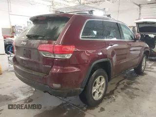 2016 Jeep Grand Cherokee Laredo z VIN 1C4RJFAG3GC471619, wystawiony jako IAAI lot #41659523 z przebiegiem 139 671 mil mil oraz . Historia ofert i sprzedaży dostępna na DreamBid. Obrazek 4.