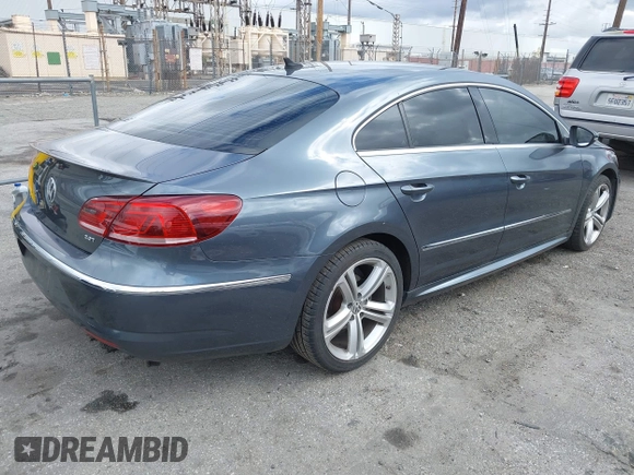 2013 Volkswagen CC Sport with VIN WVWBP7AN3DE571837, listed as a IAAI auction lot 41784447 with 156,834 mi miles. Bid and sale history available at carsss.com. Image 4.