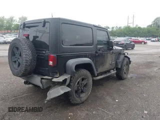 2007 Jeep Wrangler Rubicon with VIN 1J4GA64117L149666, listed as a IAAI auction lot 42252464 with 100,791 mi miles and . Bid and sale history available at DreamBid. Image 17.