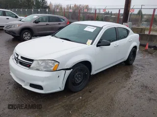 2013 Dodge Avenger SE with VIN 1C3CDZAB1DN646005, listed as a IAAI auction lot 40856048 with 143,386 mi miles and . Bid and sale history available at carsss.com. Image 2.