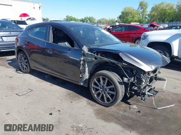 2018 Mazda 3 Touring with VIN 3MZBN1L34JM164952, listed as a IAAI auction lot 42179420 with 106,706 mi miles and . Bid and sale history available at DreamBid. Image 1.