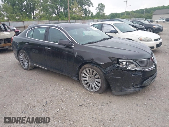2013 Lincoln MKS z VIN 1LNHL9EK0DG600129, wystawiony jako IAAI lot #42314913 z przebiegiem 119 674 mil mil oraz . Historia ofert i sprzedaży dostępna na DreamBid. Obrazek 1.