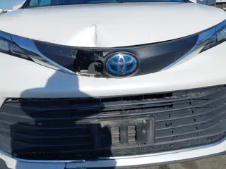 2021 Toyota Sienna XLE z VIN 5TDJRKEC7MS009306, wystawiony jako IAAI lot #42328482 z przebiegiem 169 443 mil mil oraz . Historia ofert i sprzedaży dostępna na DreamBid. Obrazek 6.