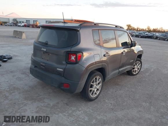 2021 Jeep Renegade Latitude with VIN ZACNJDBB0MPN13884, listed as a IAAI auction lot 40957052 with 52,023 mi miles. Bid and sale history available at carsss.com. Image 4.
