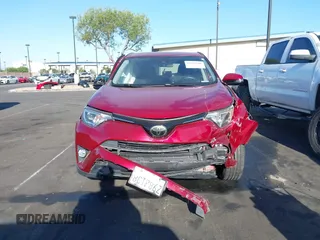 2018 Toyota RAV4 XLE with VIN JTMWFREV6JD117500, listed as a IAAI auction lot 42258588 with Not provided miles and . Bid and sale history available at DreamBid. Image 13.