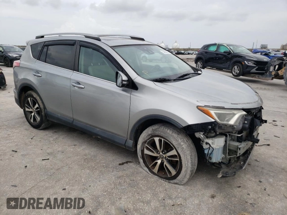 2018 Toyota RAV4 XLE with VIN 2T3WFREV2JW446388, listed as a Copart auction lot 54000675 with Not Provided miles and Salvage Title. Bid and sale history available at DreamBid. Image 4.