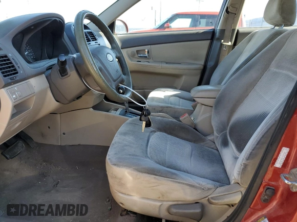 2009 Kia Spectra EX with VIN KNAFE221395656476, listed as a Copart auction lot 77700844 with 90,079 mi miles and Salvage Title. Bid and sale history available at carsss.com. Image 7.