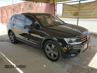 2020 Volkswagen Tiguan SE z VIN 3VV3B7AXXLM138188, wystawiony jako Copart lot #52787085 z przebiegiem 58 363 mil mil oraz Szkody całkowita. Historia ofert i sprzedaży dostępna na DreamBid. Obrazek 4.