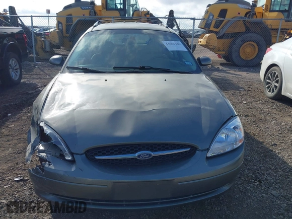 2002 Ford Taurus z VIN 1FAHP59SX2G137396, wystawiony jako IAAI lot #41661425 z przebiegiem 155 789 mil mil oraz . Historia ofert i sprzedaży dostępna na DreamBid. Obrazek 13.