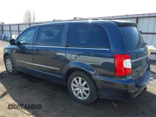 2014 Chrysler Town & Country Touring with VIN 2C4RC1BG0ER156227, listed as a IAAI auction lot 42035899 with 157,759 mi miles and . Bid and sale history available at DreamBid. Image 3.