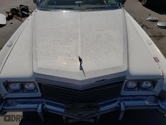 1976 Cadillac Eldorado z VIN 6L67S4Q405945, wystawiony jako Copart lot #73257834 z przebiegiem 98 761 mil mil oraz Nie do naprawy • Non repairable. Historia ofert i sprzedaży dostępna na DreamBid. Obrazek 11.