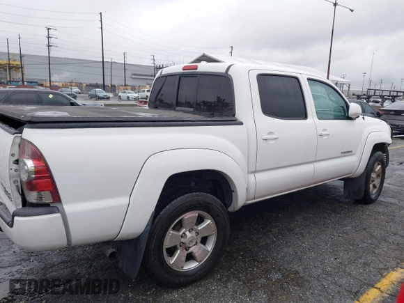 2009 Toyota Tacoma PreRunner with VIN 3TMJU62NX9M078106, listed as a IAAI auction lot 41768489 with 83,360 mi miles. Bid and sale history available at carsss.com. Image 13.