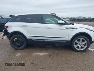 2014 Land Rover Range Rover Evoque Pure Plus z VIN SALVP2BG5EH900420, wystawiony jako IAAI lot #41940049 z przebiegiem 136 916 mil mil oraz . Historia ofert i sprzedaży dostępna na DreamBid. Obrazek 13.