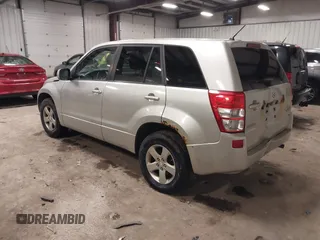 2012 Suzuki Grand Vitara Premium z VIN JS3TD0D62C4100440, wystawiony jako IAAI lot #41711815 z przebiegiem 171 527 mil mil oraz . Historia ofert i sprzedaży dostępna na DreamBid. Obrazek 3.