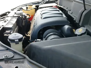 2009 Chevrolet Traverse LTZ z VIN 1GNER33D89S102490, wystawiony jako IAAI lot #42352412 z przebiegiem 56 763 mil mil oraz . Historia ofert i sprzedaży dostępna na DreamBid. Obrazek 12.