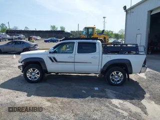 2013 Toyota Tacoma with VIN 3TMLU4EN9DM113137, listed as a IAAI auction lot 41709140 with 57,704 mi miles and . Bid and sale history available at DreamBid. Image 15.