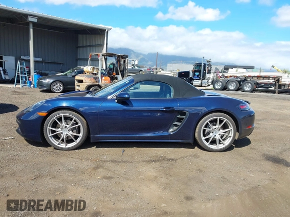 2018 Porsche 718 Boxster z VIN WP0CA2A8XJS210766, wystawiony jako IAAI lot #41617239 z przebiegiem 55 336 mil mil oraz . Historia ofert i sprzedaży dostępna na DreamBid. Obrazek 14.