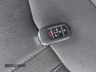 2023 Honda Pilot EX-L with VIN 5FNYG1H58PB016138, listed as a IAAI auction lot 40591717 with 10,068 mi miles and . Bid and sale history available at DreamBid. Image 11.