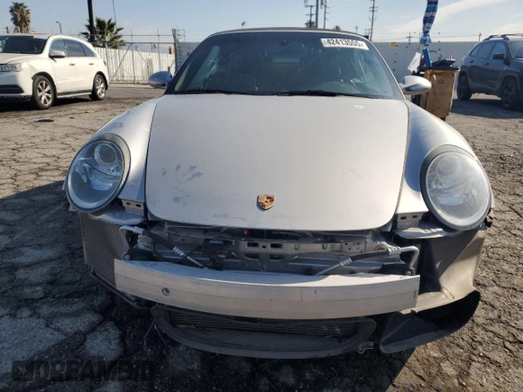 2005 Porsche 911 Carrera S z VIN WP0CB29995S765398, wystawiony jako Copart lot #42413555 z przebiegiem 32 993 mil mil oraz Szkoda całkowita • Salvage title. Historia ofert i sprzedaży dostępna na DreamBid. Obrazek 5.