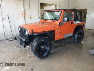 2006 Jeep Wrangler X with VIN 1J4FA39SX6P703094, listed as a Copart auction lot 55956695 with 146,413 mi miles and Salvage title. Bid and sale history available at DreamBid. Image 1.