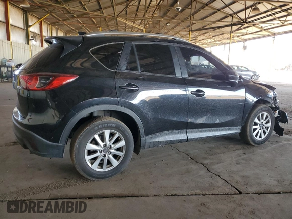 2014 Mazda CX-5 Touring with VIN JM3KE2CY4E0379574, listed as a Copart auction lot 48509655 with 178,102 mi miles and Salvage Title. Bid and sale history available at DreamBid. Image 3.