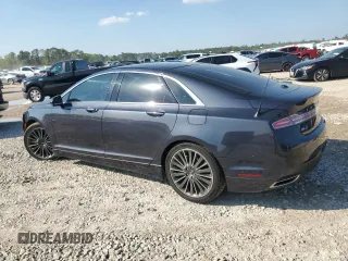 2014 Lincoln MKZ z VIN 3LN6L2JK6ER833317, wystawiony jako Copart lot #50555105 z przebiegiem 157 510 mil mil oraz Szkoda całkowita • Salvage title. Historia ofert i sprzedaży dostępna na DreamBid. Obrazek 2.