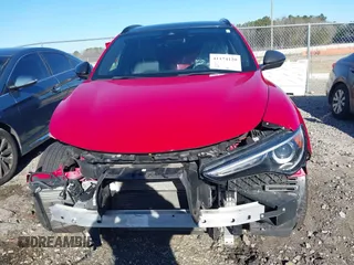 2019 Alfa Romeo Stelvio Ti Sport z VIN ZASPAKBN6K7C43720, wystawiony jako IAAI lot #41174120 z przebiegiem 55 446 mil mil oraz . Historia ofert i sprzedaży dostępna na DreamBid. Obrazek 13.