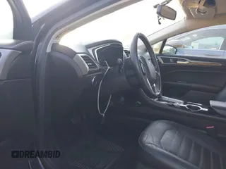 2013 Ford Fusion SE Hybrid с VIN 3FA6P0LU3DR351906, выставлен на аукционе IAAI как лот 42841416 с пробегом 243 206 миль миль и . История ставок и продаж доступна на DreamBid. Изображение 5.