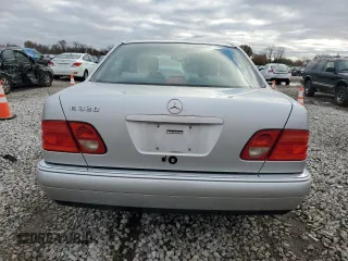 1997 Mercedes-Benz E-Class with VIN WDBJF55F1VA309179, listed as a Copart auction lot 79222994 with 122,100 mi miles and Salvage Title. Bid and sale history available at carsss.com. Image 6.