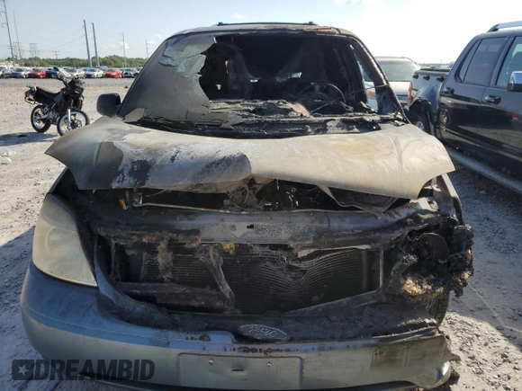 2004 Ford Freestar SE z VIN 2FMZA51674BB22374, wystawiony jako Copart lot #57065105 z przebiegiem Nie podano mil oraz Szkoda całkowita • Salvage title. Historia ofert i sprzedaży dostępna na DreamBid. Obrazek 5.