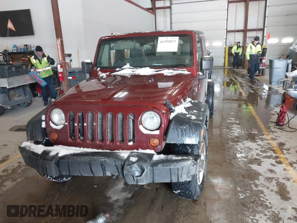 2009 Jeep Wrangler Unlimited X with VIN 1J4GZ39159L718649, listed as a IAAI auction lot 41395033 with 289,574 mi miles. Bid and sale history available at carsss.com. Image 12.
