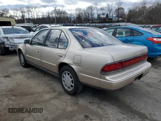1990 Nissan Maxima z VIN JN1HJ01P8LT402950, wystawiony jako Copart lot #82714734 z przebiegiem 60 727 mil mil oraz Tytuł czysty. Historia ofert i sprzedaży dostępna na DreamBid. Obrazek 2.