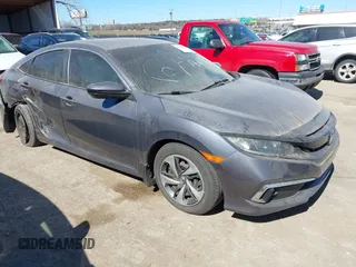 2020 Honda Civic LX z VIN 2HGFC2F64LH575356, wystawiony jako IAAI lot #41685445 z przebiegiem 69 856 mil mil oraz . Historia ofert i sprzedaży dostępna na DreamBid. Obrazek 1.